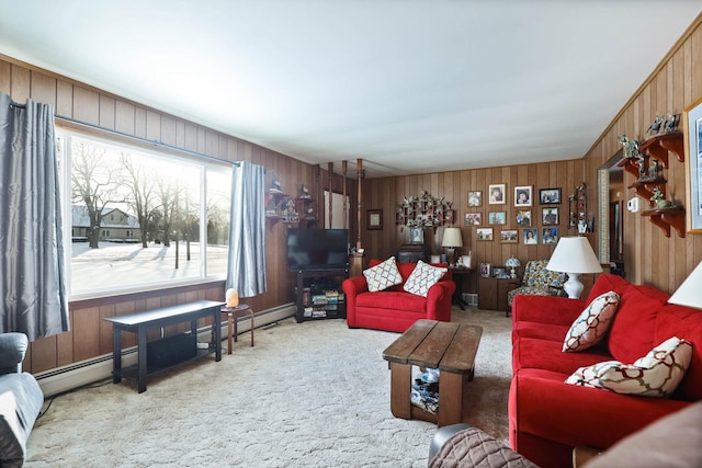 carpeted living room featuring wooden walls and baseboard heating