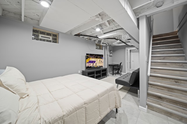 bedroom featuring light tile patterned flooring