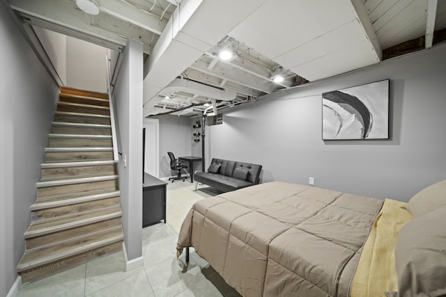 bedroom featuring tile patterned flooring