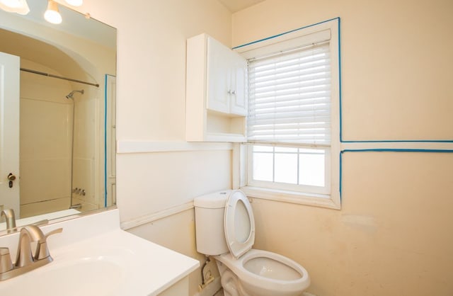 bathroom with toilet and vanity