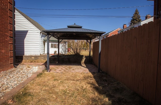 view of yard featuring a gazebo and fence