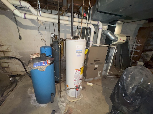utility room with gas water heater