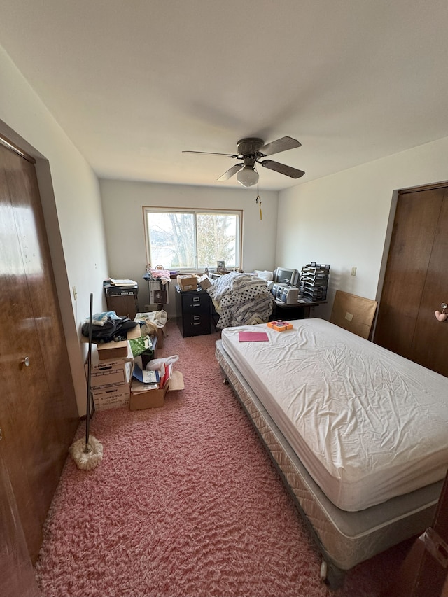 carpeted bedroom with ceiling fan