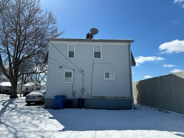 view of snow covered property