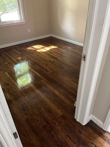 24640 Wilmot Ave, Eastpointe, MI 48021 - unfurnished room with dark wood finished floors and baseboards