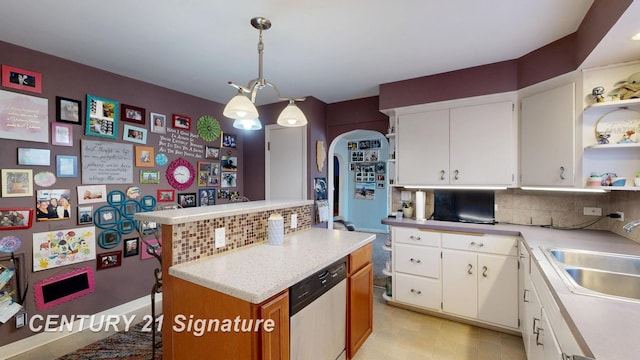 kitchen featuring open shelves, a sink, decorative backsplash, light countertops, and dishwasher