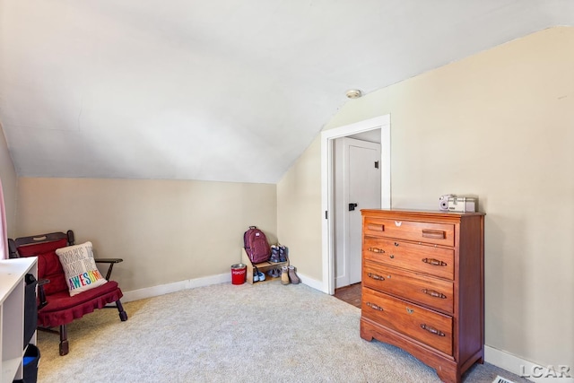 rec room with baseboards, carpet flooring, and vaulted ceiling