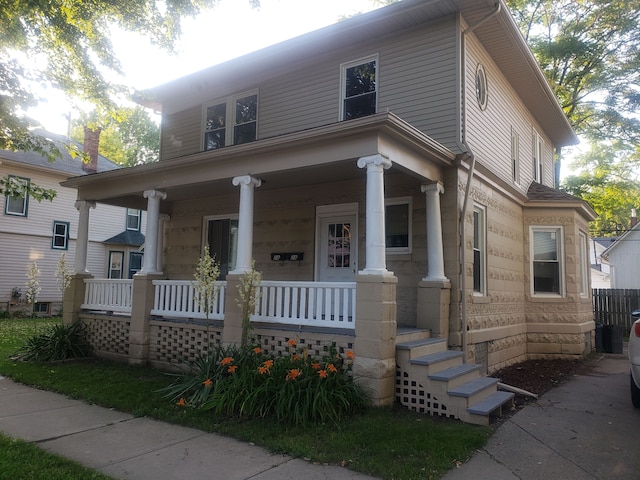 view of front of property featuring covered porch