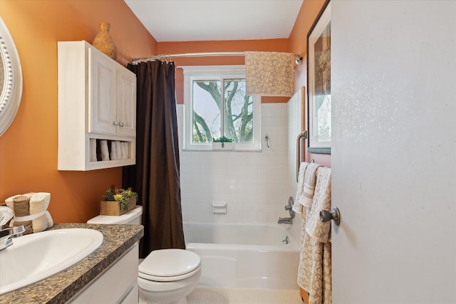 bathroom featuring toilet, vanity, and shower / bathtub combination with curtain