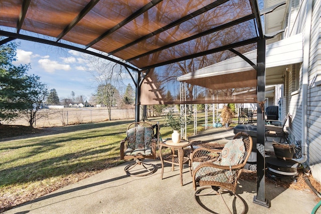 view of patio / terrace featuring fence