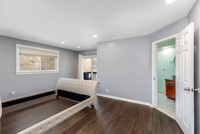 bedroom featuring recessed lighting, baseboards, and wood finished floors