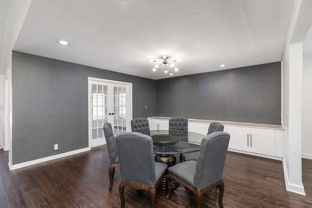 dining area featuring baseboards, dark wood-style flooring, and french doors