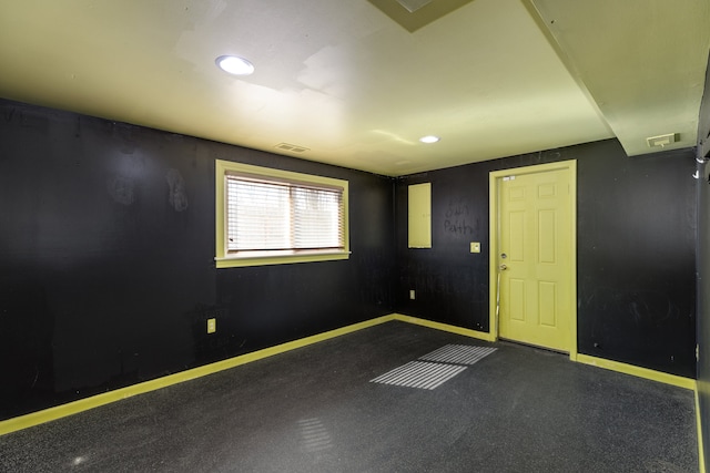 spare room with recessed lighting, visible vents, baseboards, and carpet flooring