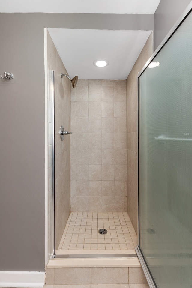 bathroom featuring a stall shower