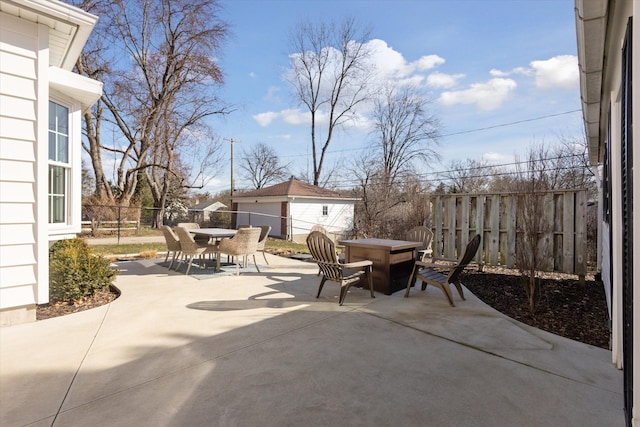 view of patio / terrace featuring outdoor dining space and fence