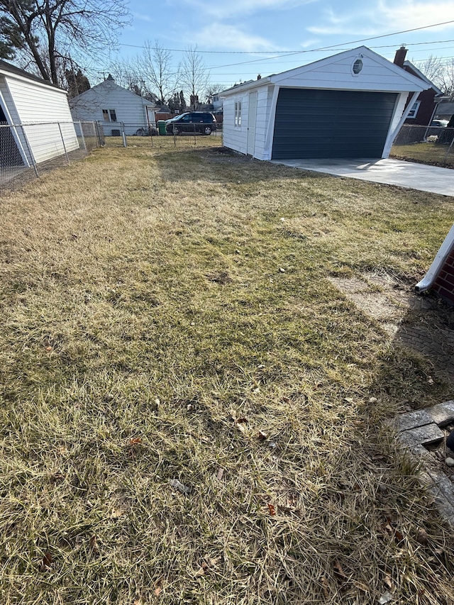 view of yard featuring an outdoor structure and fence