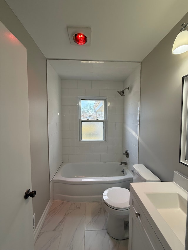 full bath featuring baseboards, shower / washtub combination, toilet, marble finish floor, and vanity