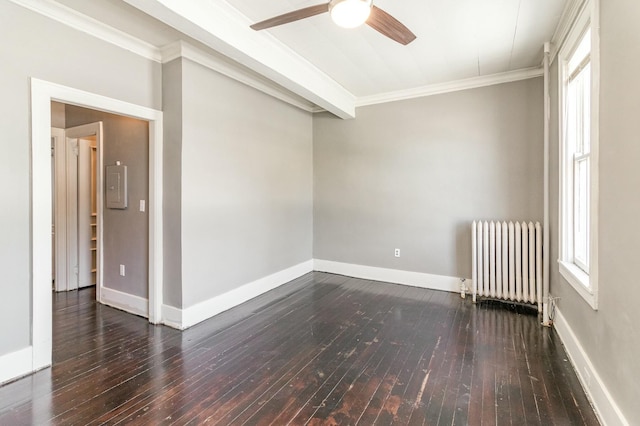 empty room with radiator, ceiling fan, baseboards, hardwood / wood-style floors, and ornamental molding