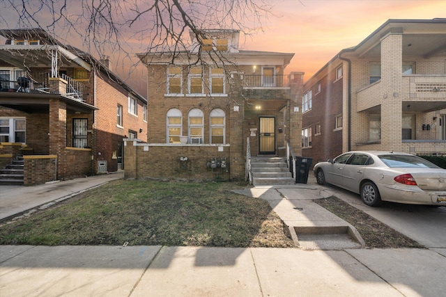 view of front of property featuring brick siding