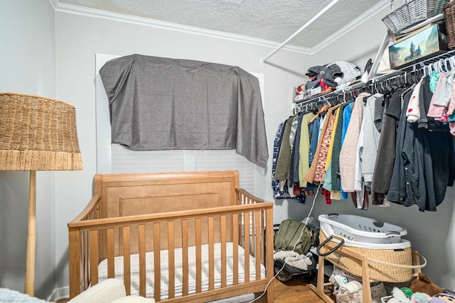 walk in closet featuring wood finished floors