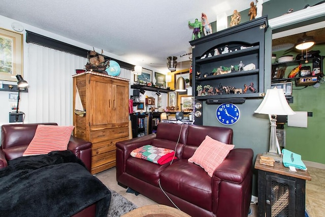 living room featuring a textured ceiling