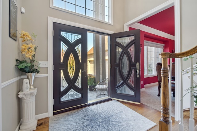 foyer with wood finished floors