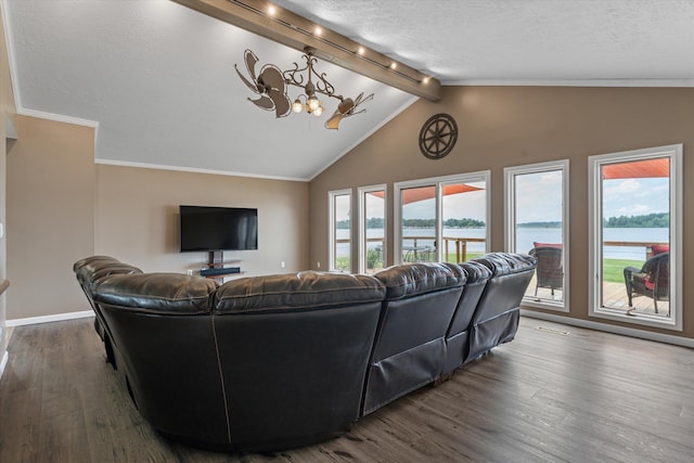 living area featuring a textured ceiling, vaulted ceiling with beams, and wood finished floors