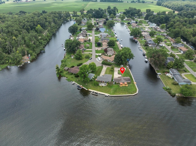 bird's eye view with a residential view and a water view