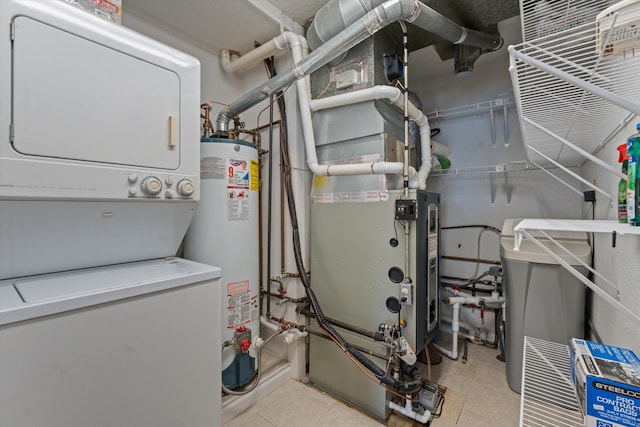 utility room featuring gas water heater and stacked washer and clothes dryer