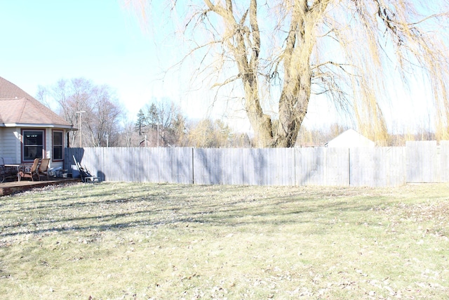 view of yard with fence