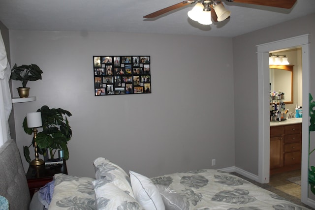 bedroom with a ceiling fan and ensuite bathroom