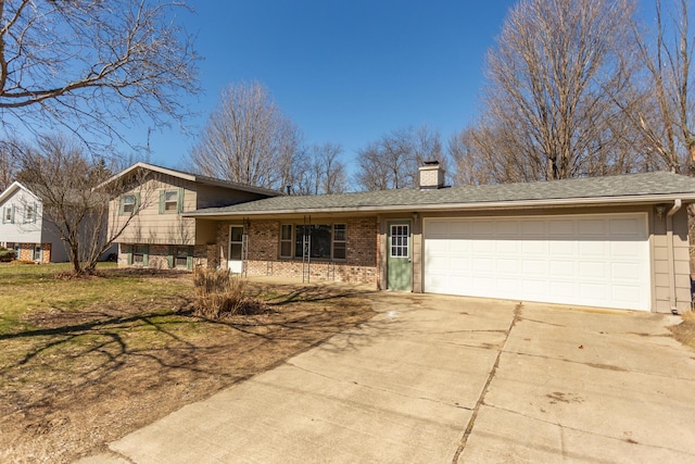 split level home featuring brick siding, a chimney, concrete driveway, and an attached garage