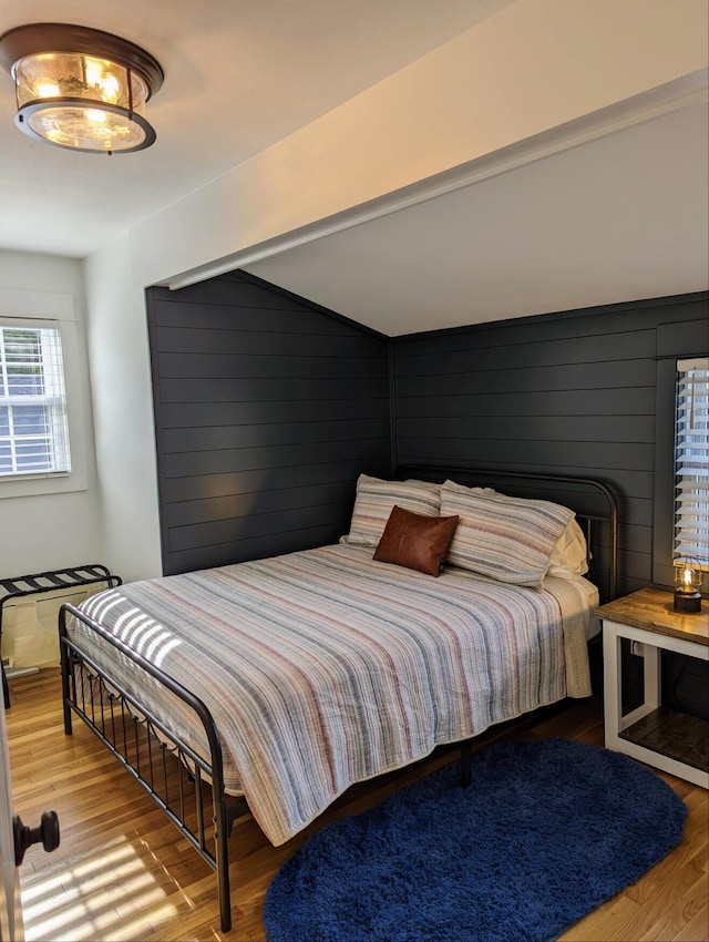 bedroom with wood finished floors