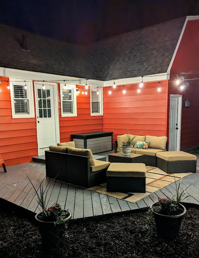 wooden deck with an outdoor hangout area