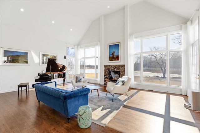 1265 Water Cliff Dr, Bloomfield Hills, MI 48302 - living room featuring high vaulted ceiling, a premium fireplace, wood finished floors, and recessed lighting