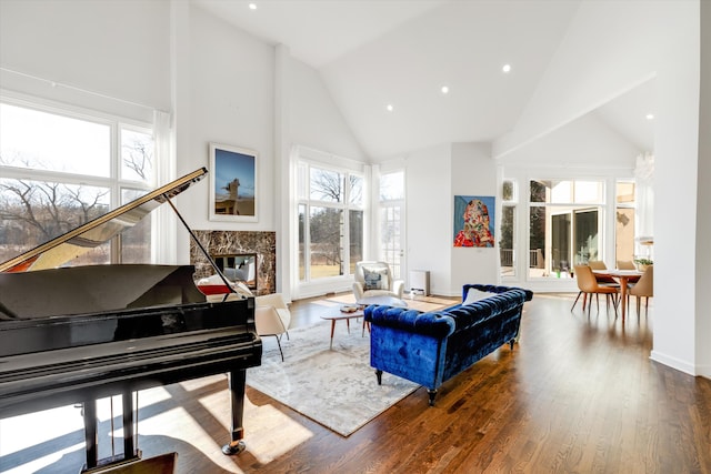 1265 Water Cliff Dr, Bloomfield Hills, MI 48302 - living area with high vaulted ceiling, wood finished floors, and recessed lighting