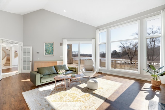 1265 Water Cliff Dr, Bloomfield Hills, MI 48302 - living area featuring high vaulted ceiling and wood finished floors