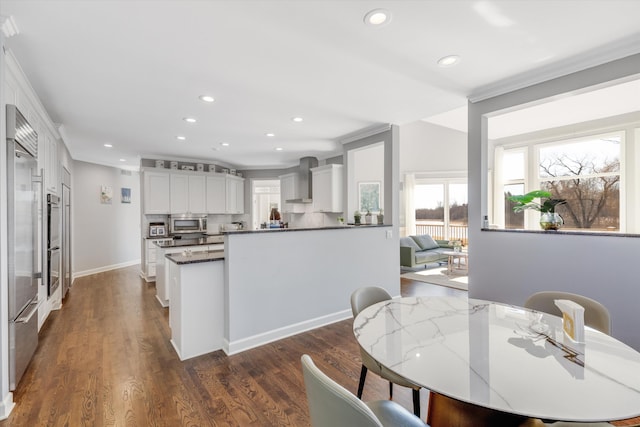1265 Water Cliff Dr, Bloomfield Hills, MI 48302 - kitchen featuring stainless steel appliances, recessed lighting, dark countertops, white cabinetry, and dark wood-style floors