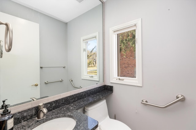1265 Water Cliff Dr, Bloomfield Hills, MI 48302 - bathroom with toilet and vanity