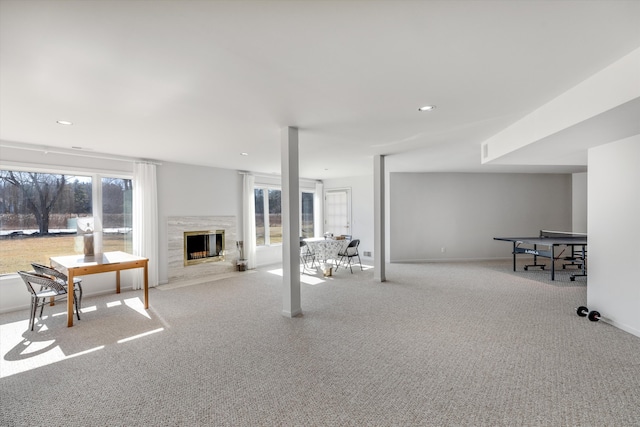 1265 Water Cliff Dr, Bloomfield Hills, MI 48302 - below grade area featuring a premium fireplace, carpet floors, and recessed lighting