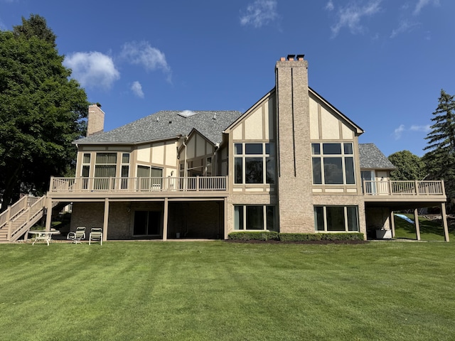 1265 Water Cliff Dr, Bloomfield Hills, MI 48302 - rear view of property featuring a chimney, a deck, a yard, and stucco siding