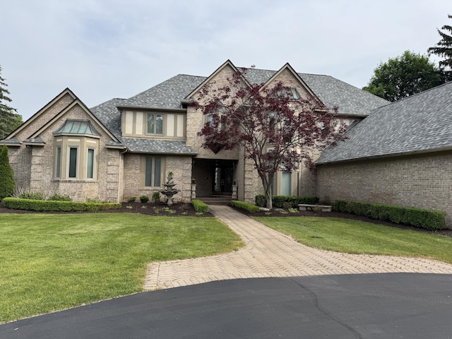 1265 Water Cliff Dr, Bloomfield Hills, MI 48302 - view of front of property with a front lawn and brick siding