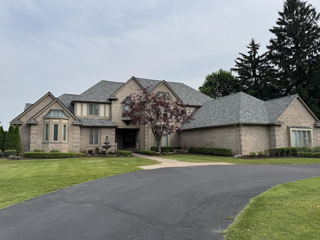 1265 Water Cliff Dr, Bloomfield Hills, MI 48302 - view of front of home with a front yard