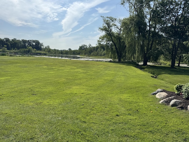 1265 Water Cliff Dr, Bloomfield Hills, MI 48302 - view of community with a water view and a lawn
