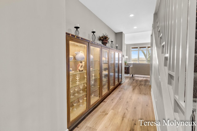 corridor featuring recessed lighting and light wood finished floors