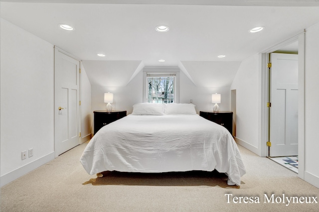 bedroom featuring recessed lighting, baseboards, and light carpet