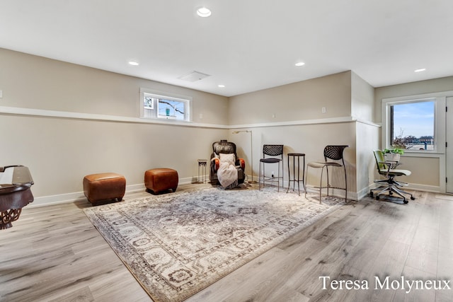 sitting room featuring recessed lighting, baseboards, and wood finished floors