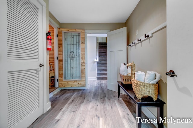 interior space with stairway and wood finished floors