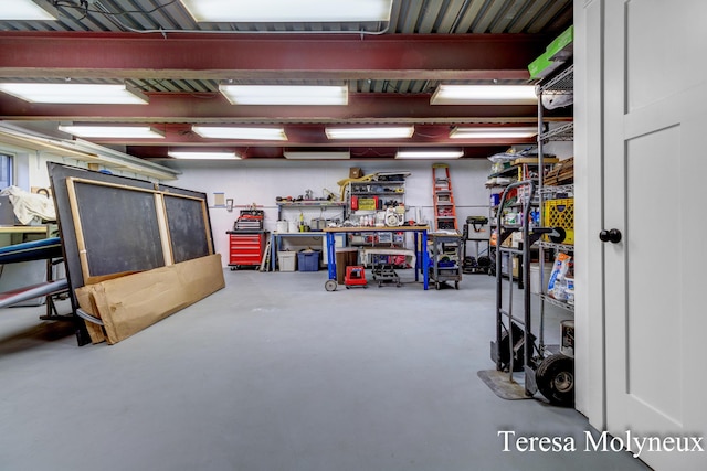 garage with a workshop area