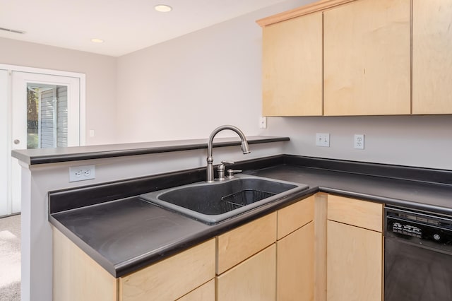 kitchen featuring dark countertops, visible vents, light brown cabinets, dishwasher, and a sink